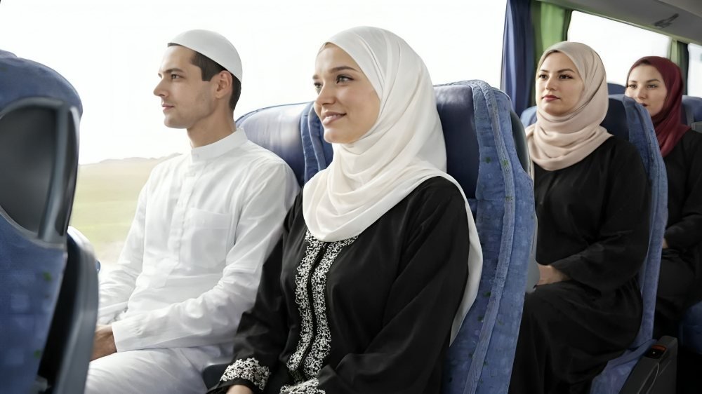 Comfortable bus interior for Umrah transportation service Saudi Arabia
